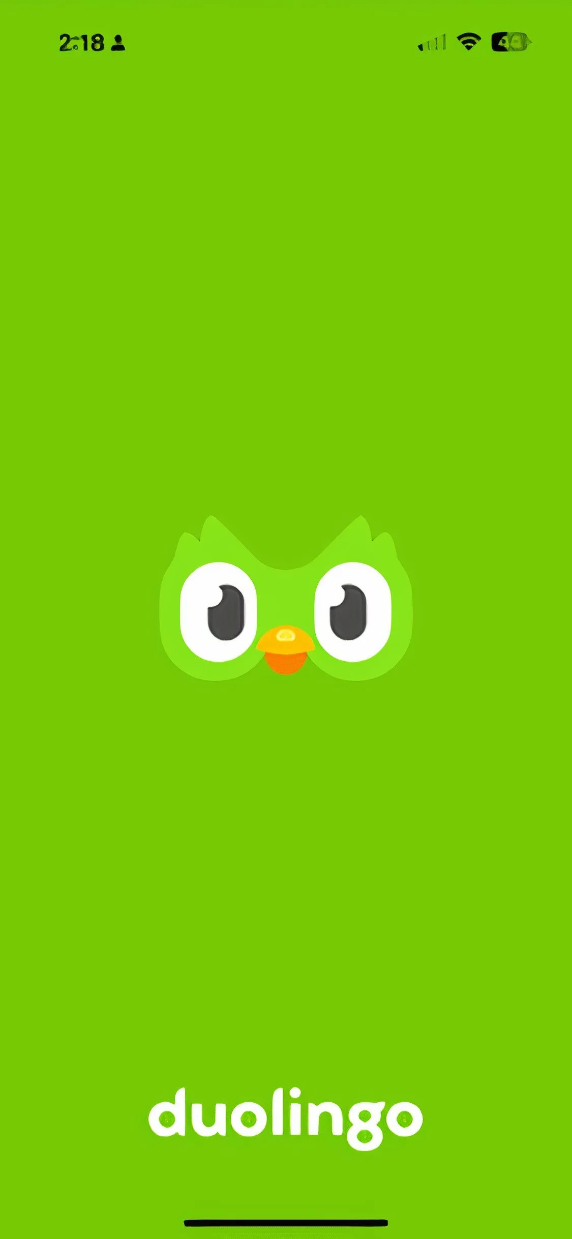 Ảnh chụp màn hình chào mừng của ứng dụng học ngôn ngữ Duolingo với logo và biểu tượng chim cú xanh đặc trưng