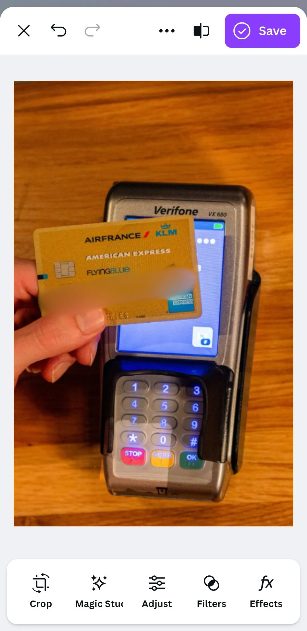 Canva app showing an image of a credit card with numbers blurred