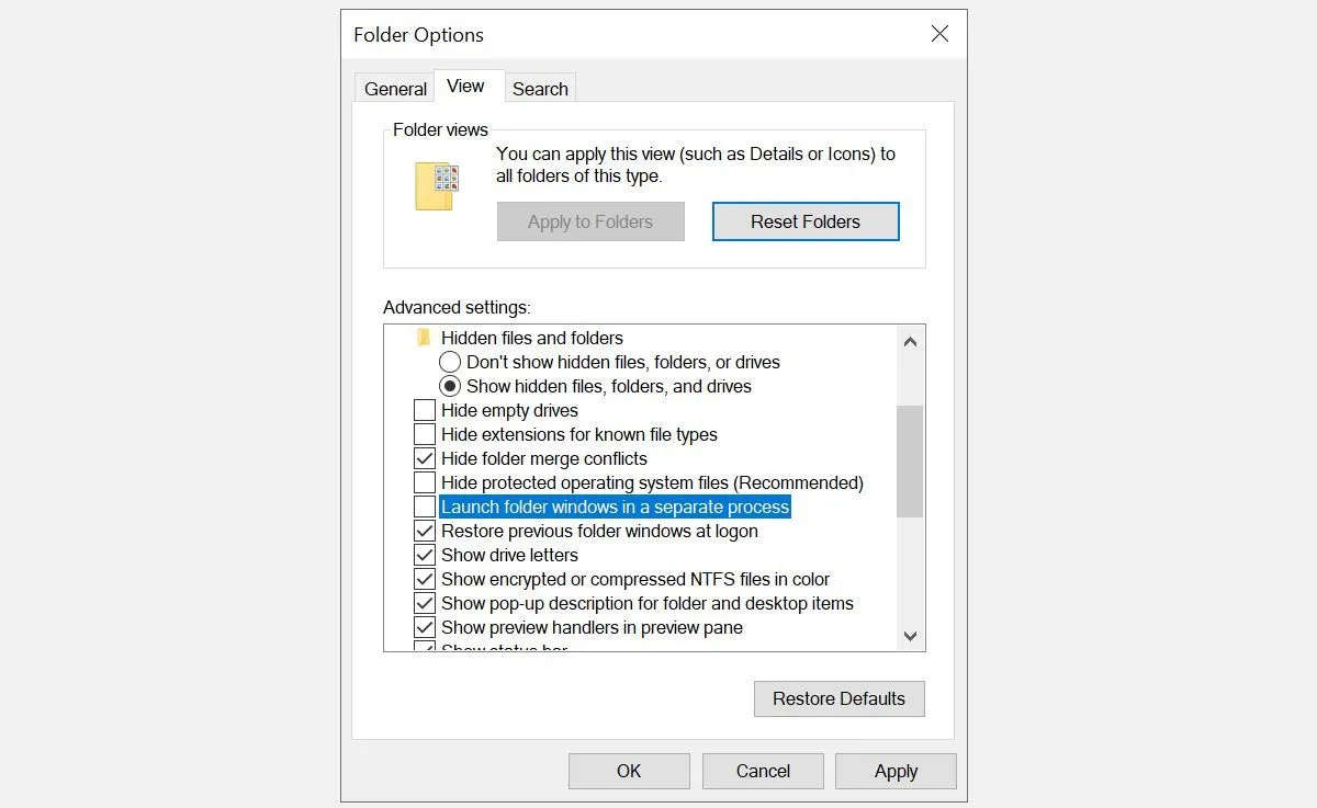 Cửa sổ &quot;Folder Options&quot; trên Windows, hiển thị tab &quot;View&quot; với tùy chọn &quot;Launch folder windows in a separate process&quot;.