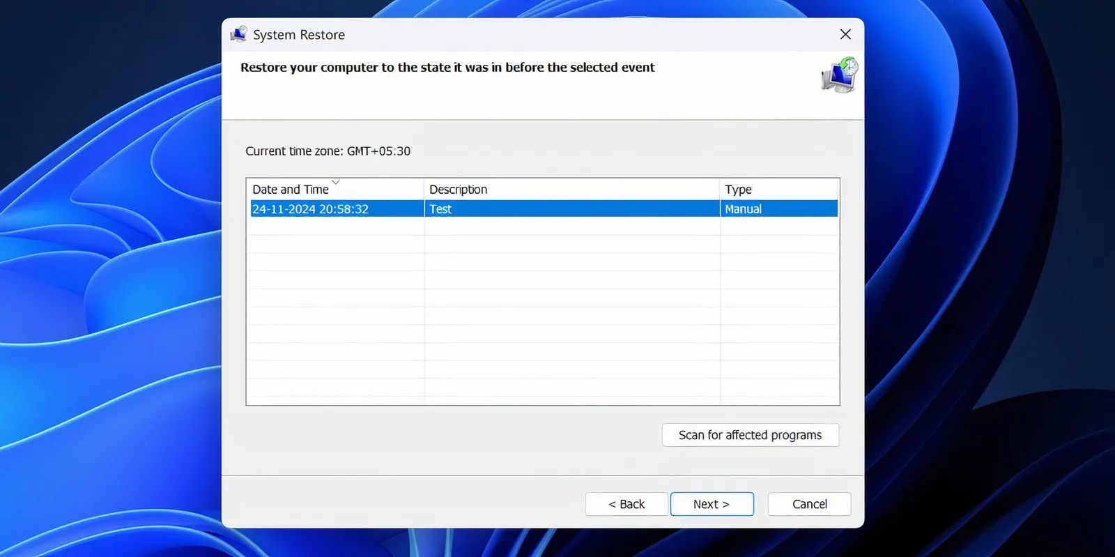 Cửa sổ System Restore với điểm khôi phục được chọn