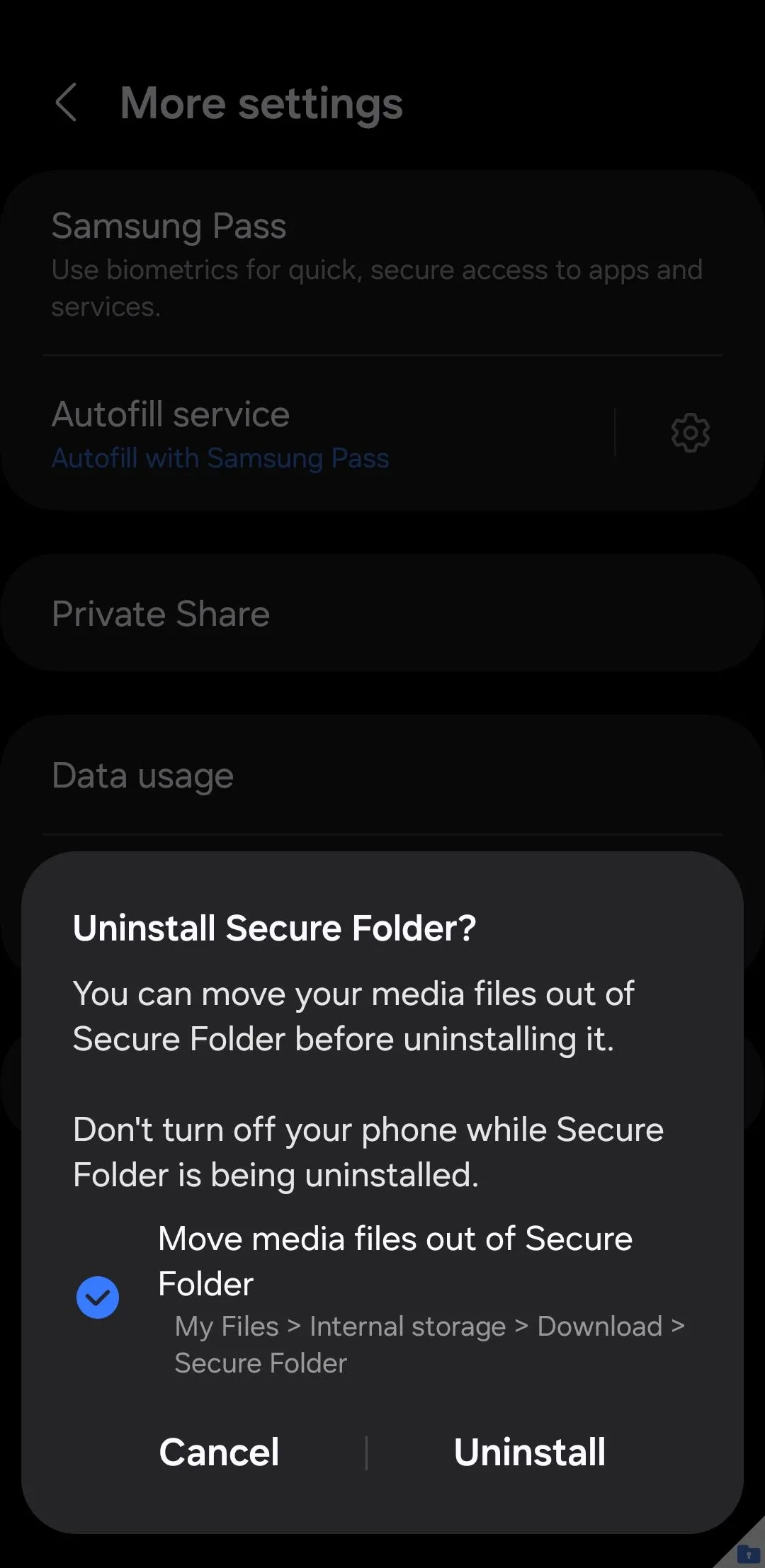Cửa sổ xác nhận gỡ cài đặt Secure Folder và tùy chọn di chuyển tệp phương tiện