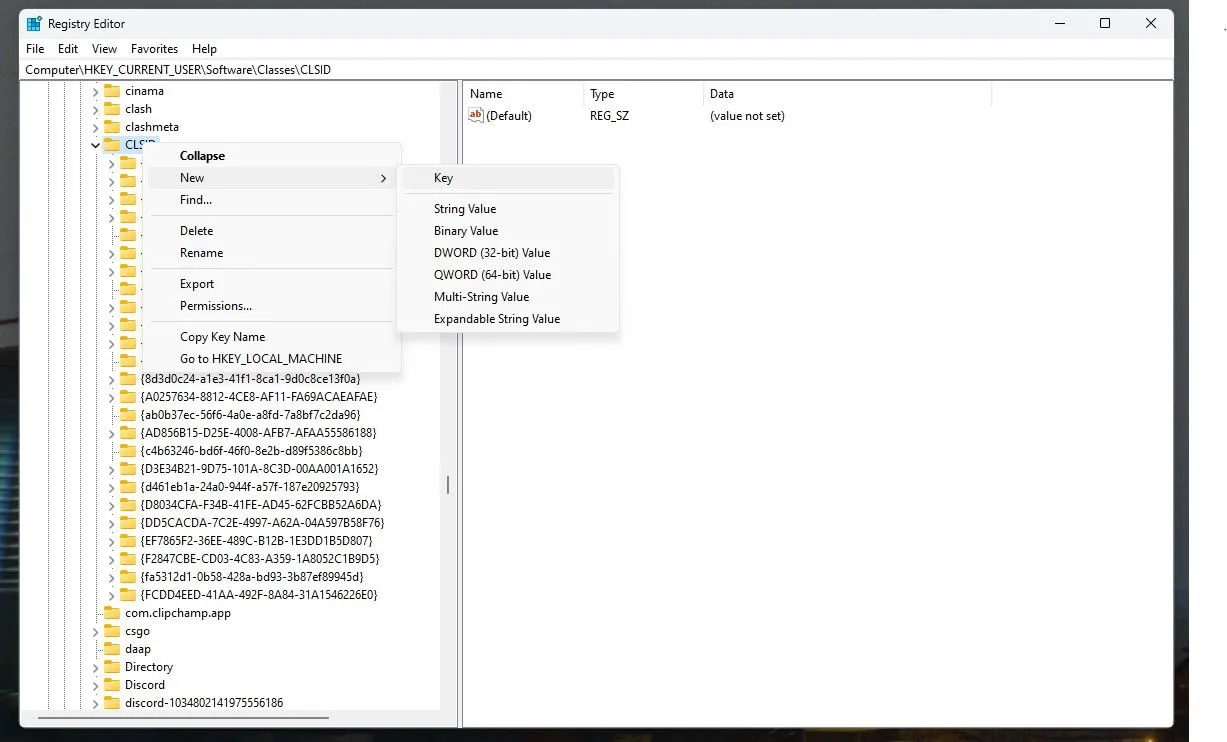 Giao diện Registry Editor Windows 11 hiển thị khóa CLSID và menu tạo khóa mới