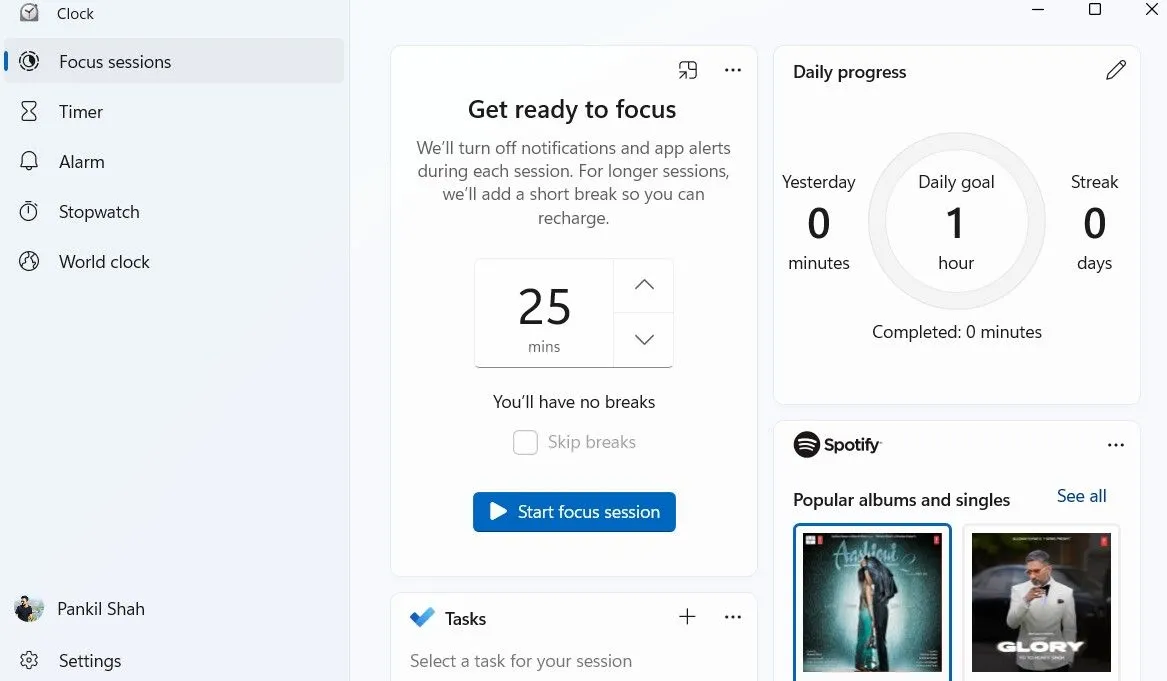 Giao diện tab Phiên Tập Trung (Focus Sessions) trong ứng dụng Đồng Hồ của Windows 11, hiển thị tích hợp với Spotify và Microsoft To Do