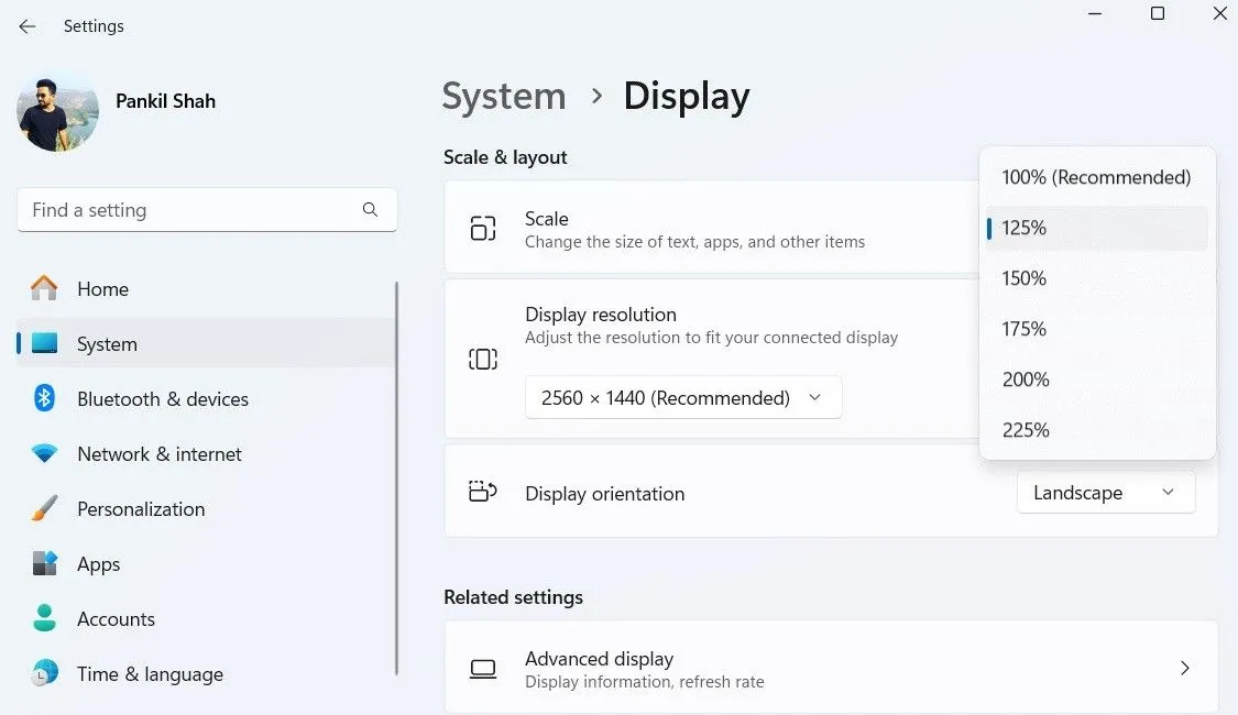 Menu cài đặt Tỷ lệ hiển thị (Display Scale) trong Windows 11, hiển thị các tùy chọn để điều chỉnh kích thước văn bản, ứng dụng và các mục khác trên màn hình.