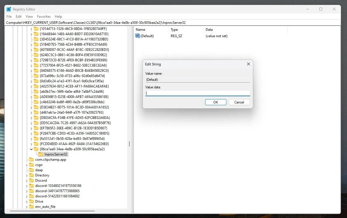 Registry Editor với khóa InprocServer32 được chọn và giá trị mặc định được thiết lập
