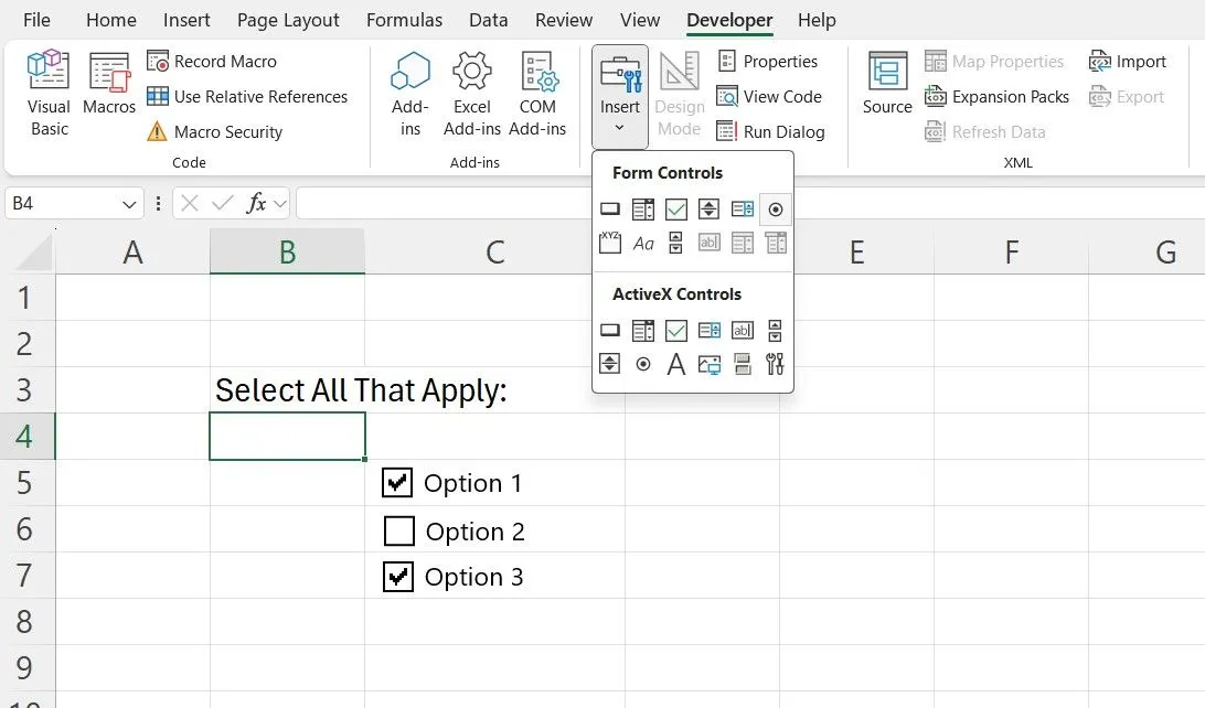 Thẻ Developer trong Excel hiển thị các tùy chọn điều khiển biểu mẫu, bao gồm hộp kiểm (checkboxes) để tạo form tùy chỉnh.