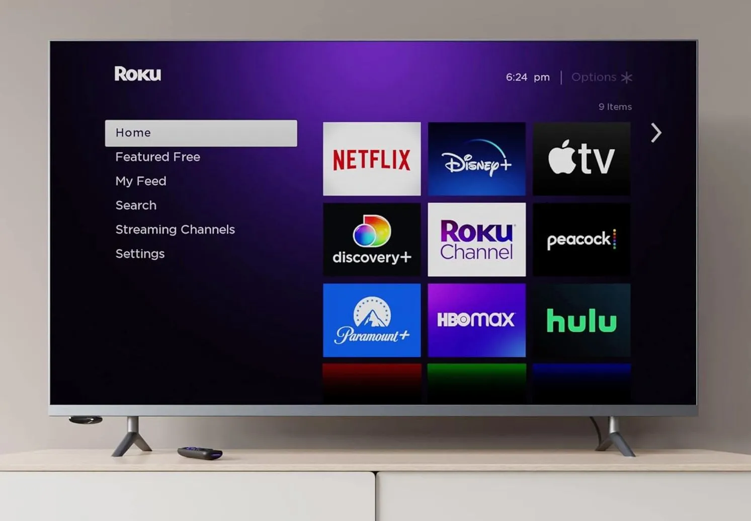 Thiết bị streaming Roku Express nhỏ gọn với logo Roku màu tím