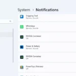 Cài đặt thông báo cho ứng dụng cụ thể trên Windows 11, hiển thị tùy chọn bật/tắt thông báo cho từng ứng dụng như Outlook hoặc WhatsApp