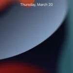 Màn hình khóa iPhone hiển thị yêu cầu vuốt lên và sử dụng Touch ID để mở khóa khi không có Face ID